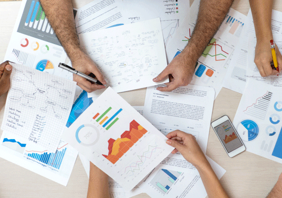 Pages with graphs and people reviewing them